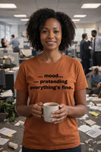 Cheerful woman in a chaotic office wearing mood pretending everything's fine tee ideal for overwhelmed coworkers.