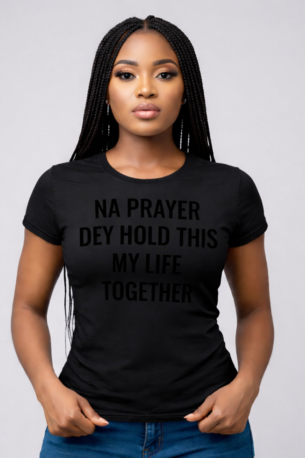 Calm woman standing straight wearing na prayer dey hold this my life together steady spirit gift.