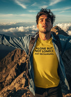 Adventurous introvert look: man in Alone but not lonely. Just recharging. shirt in the mountains; unique gift for a traveler or a solo hiker