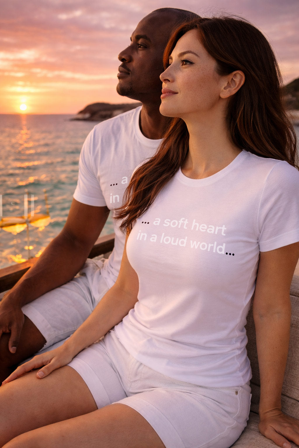 Romantic lifestyle shot of couple wearing a soft heart in a loud world sharing quiet connection at sunset.