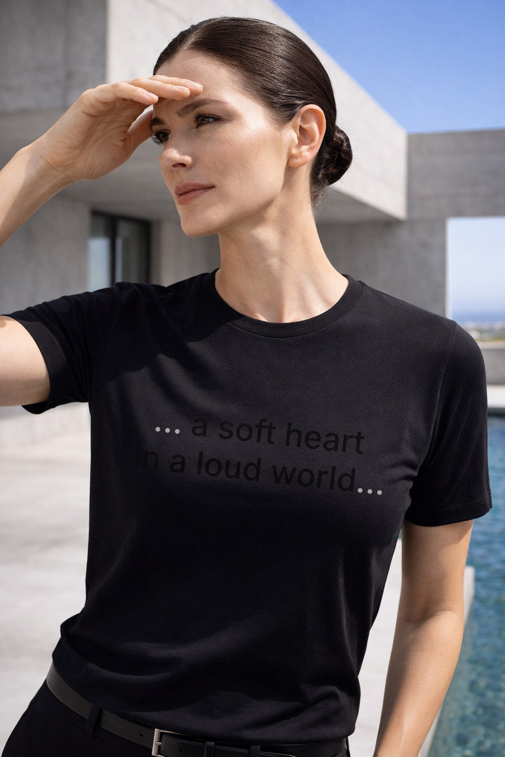 Relaxed moment with woman wearing a soft heart in a loud world offering peace through her gentle nature.